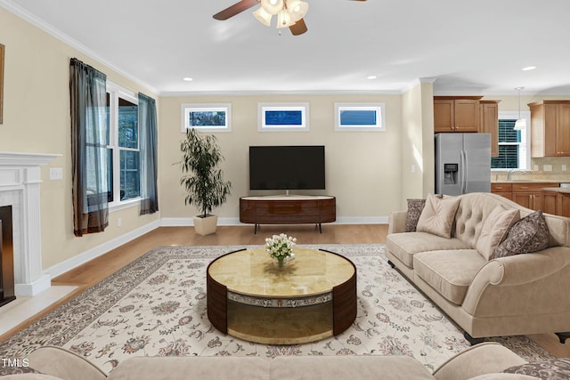 498 Mountain Laurel, Chapel Hill, NC 27517 - living room with ceiling fan, light wood-style floors, recessed lighting, a premium fireplace, and ornamental molding