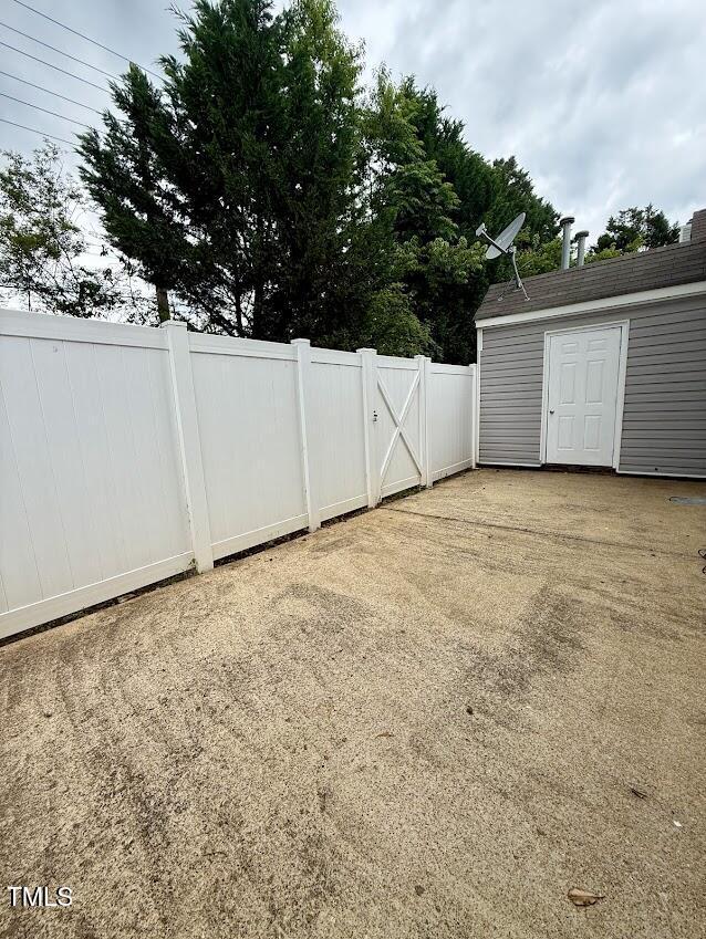 5071 Avenida Del Sol Dr, Raleigh, NC 27616 - view of yard with an outbuilding