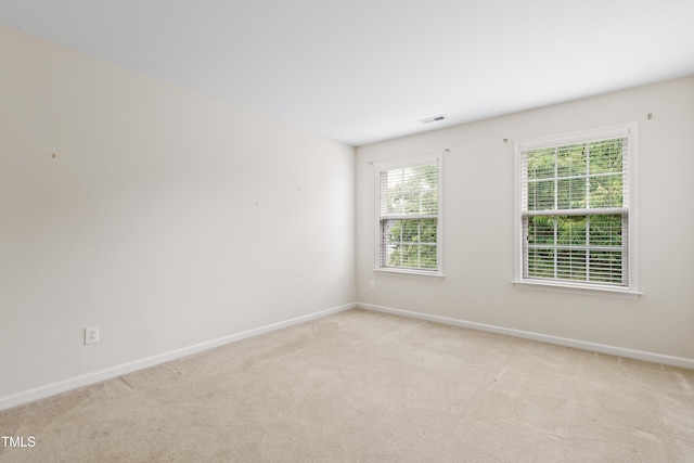 1405 Merrilow Ct, Wake Forest, NC 27587 - unfurnished room with baseboards and light colored carpet