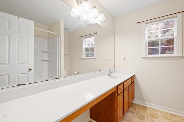 1405 Merrilow Ct, Wake Forest, NC 27587 - full bath featuring vanity, plenty of natural light, baseboards, and toilet