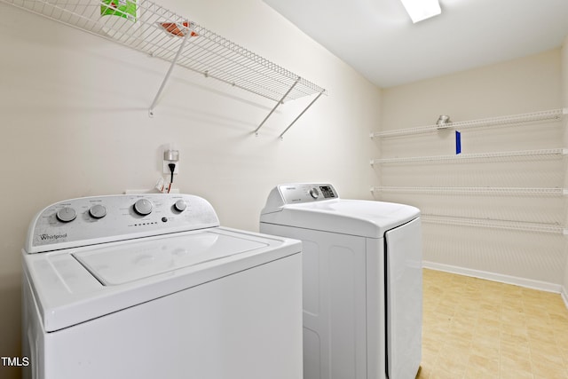 1405 Merrilow Ct, Wake Forest, NC 27587 - washroom featuring separate washer and dryer, baseboards, and light floors