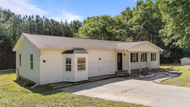 282 Cooke Rd, Louisburg, NC 27549 - ranch-style home with a porch and roof with shingles