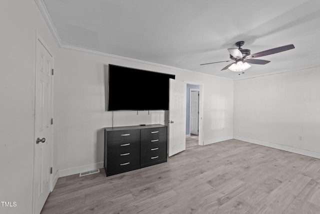 282 Cooke Rd, Louisburg, NC 27549 - unfurnished bedroom featuring ornamental molding, light wood-style flooring, baseboards, and ceiling fan