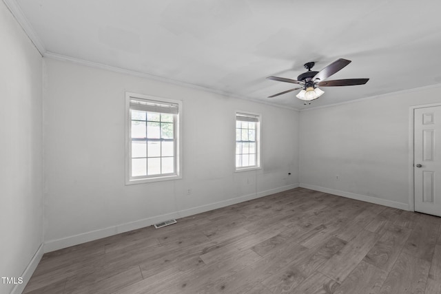 282 Cooke Rd, Louisburg, NC 27549 - unfurnished room featuring light wood-style floors, crown molding, ceiling fan, and baseboards