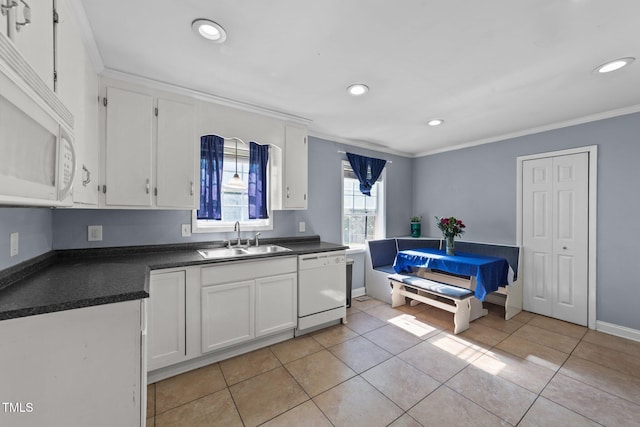 282 Cooke Rd, Louisburg, NC 27549 - kitchen featuring a sink, white appliances, crown molding, dark countertops, and white cabinets