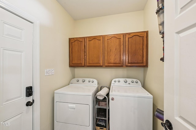 6829 Wood Forest Dr, Cary, NC 27519 - laundry area with independent washer and dryer and cabinet space