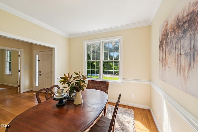 6829 Wood Forest Dr, Cary, NC 27519 - dining space with ornamental molding and wood finished floors