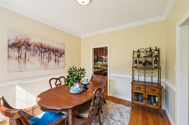 6829 Wood Forest Dr, Cary, NC 27519 - dining space with ornamental molding and wood finished floors