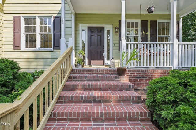 6829 Wood Forest Dr, Cary, NC 27519 - view of exterior entry with covered porch