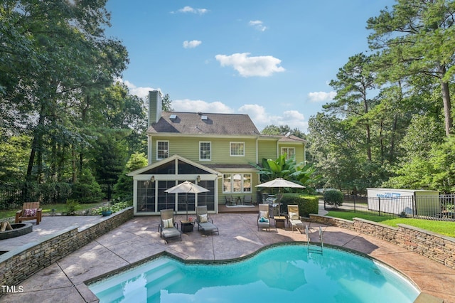 6829 Wood Forest Dr, Cary, NC 27519 - view of swimming pool featuring a patio and a sunroom