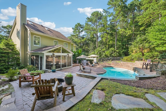 6829 Wood Forest Dr, Cary, NC 27519 - view of pool with a sunroom and a patio area