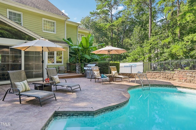 6829 Wood Forest Dr, Cary, NC 27519 - view of pool with a patio and a grill