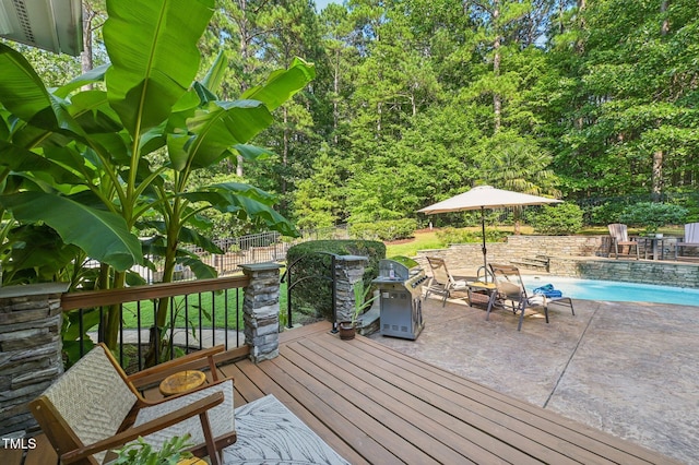 6829 Wood Forest Dr, Cary, NC 27519 - wooden deck featuring area for grilling and a patio