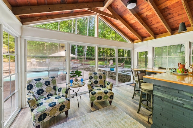 6829 Wood Forest Dr, Cary, NC 27519 - sunroom / solarium with a wood ceiling with exposed beams, wood finished floors, and high vaulted ceiling