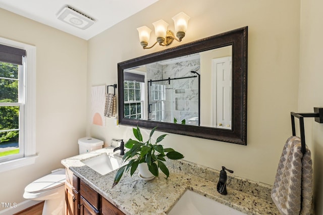6829 Wood Forest Dr, Cary, NC 27519 - full bathroom with double vanity and a tile shower