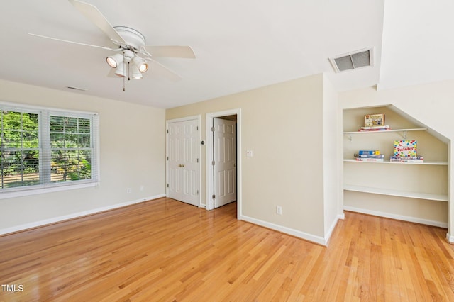 6829 Wood Forest Dr, Cary, NC 27519 - unfurnished bedroom featuring light wood-style floors and a ceiling fan