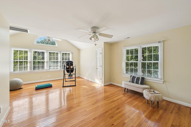 6829 Wood Forest Dr, Cary, NC 27519 - exercise area with wood-type flooring, healthy amount of natural light, a ceiling fan, and vaulted ceiling