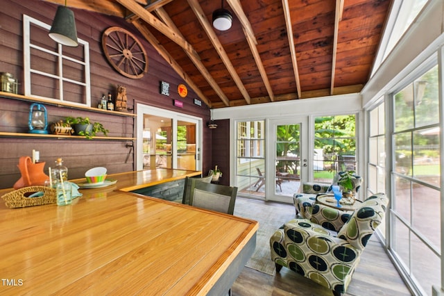 6829 Wood Forest Dr, Cary, NC 27519 - dining room featuring a wooden ceiling with exposed beams, wooden walls, high vaulted ceiling, french doors, and wood finished floors