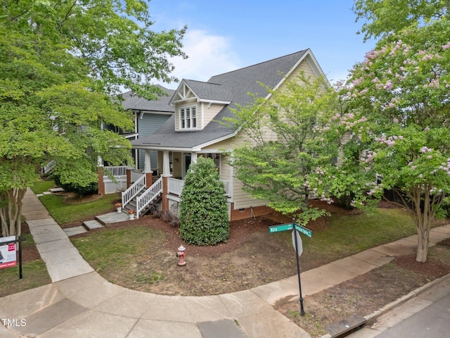 10579 Evergreen Spring Pl, Raleigh, NC 27614 - view of front of house with roof with shingles, a porch, crawl space, and stairs