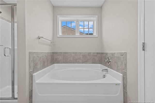 1712 Stackhouse Dr, Fayetteville, NC 28314 - bathroom with a bath and a shower stall