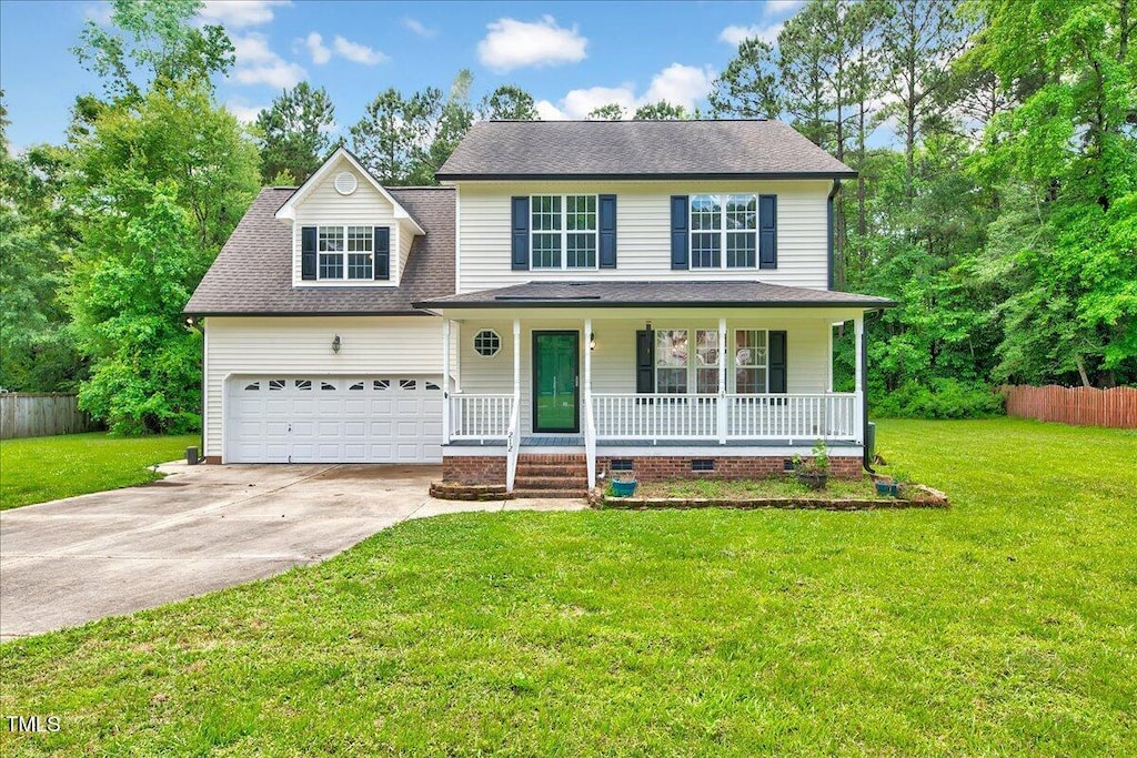 212 Spearhead Pl, Clayton, NC 27520 - view of front of house featuring covered porch, concrete driveway, a shingled roof, and a garage