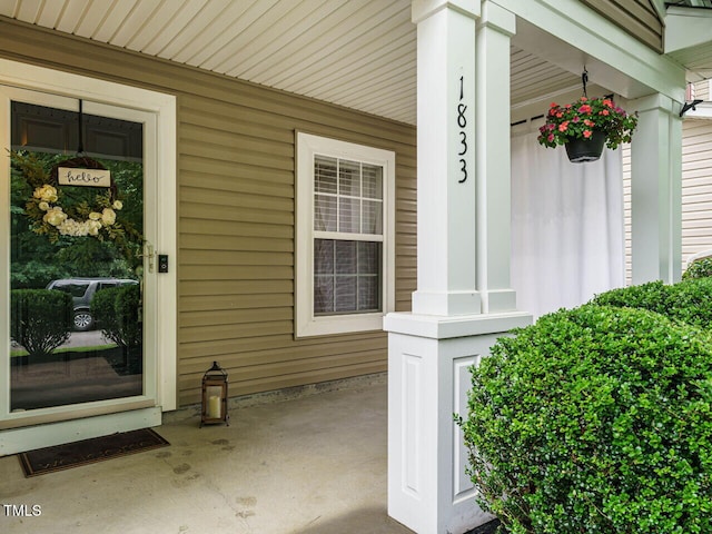 1833 Creek Oak Cir, Fuquay Varina, NC 27526 - view of exterior entry with a porch