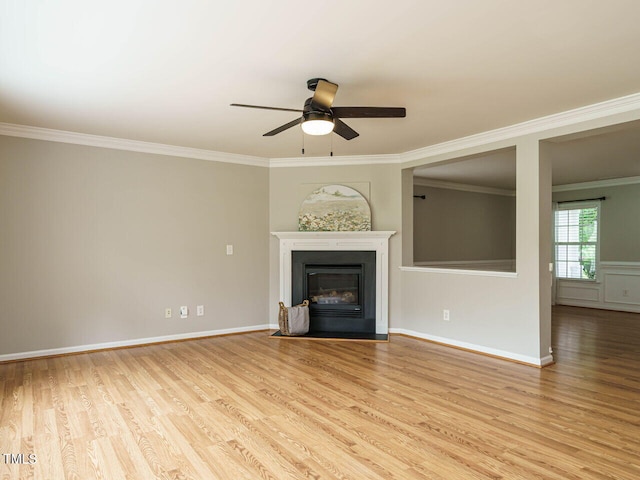 1833 Creek Oak Cir, Fuquay Varina, NC 27526 - unfurnished living room featuring wood finished floors, ceiling fan, ornamental molding, a fireplace with flush hearth, and baseboards