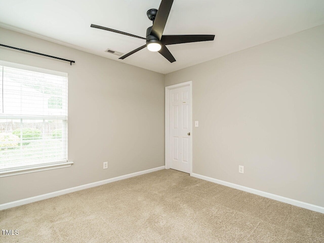 1833 Creek Oak Cir, Fuquay Varina, NC 27526 - carpeted empty room featuring a ceiling fan, baseboards, and plenty of natural light