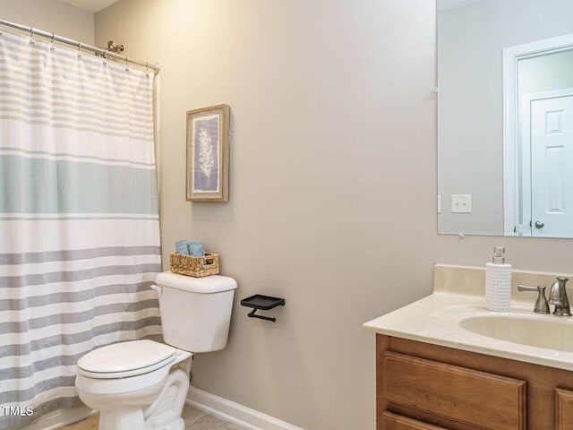 1833 Creek Oak Cir, Fuquay Varina, NC 27526 - bathroom with toilet, vanity, baseboards, and curtained shower
