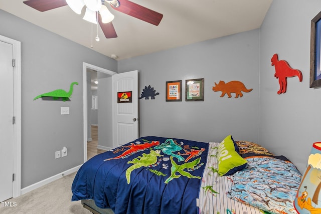 2709 Banks Lake Ct, Fuquay Varina, NC 27526 - carpeted bedroom featuring baseboards and a ceiling fan
