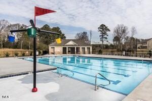 461 Cedar Pond Ct, Knightdale, NC 27545 - community pool featuring a patio area