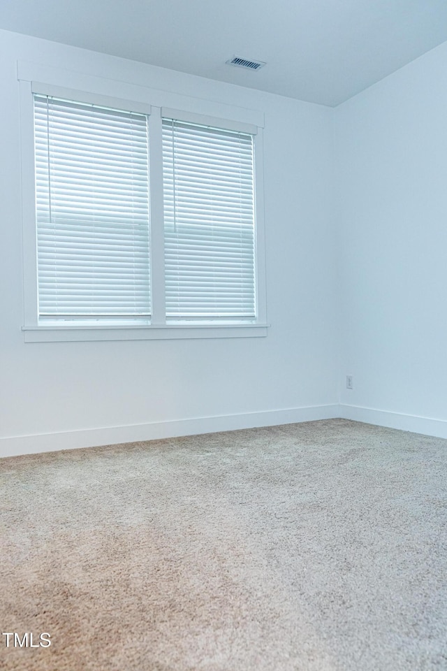 1950 Menet St, Apex, NC 27502 - carpeted spare room with baseboards