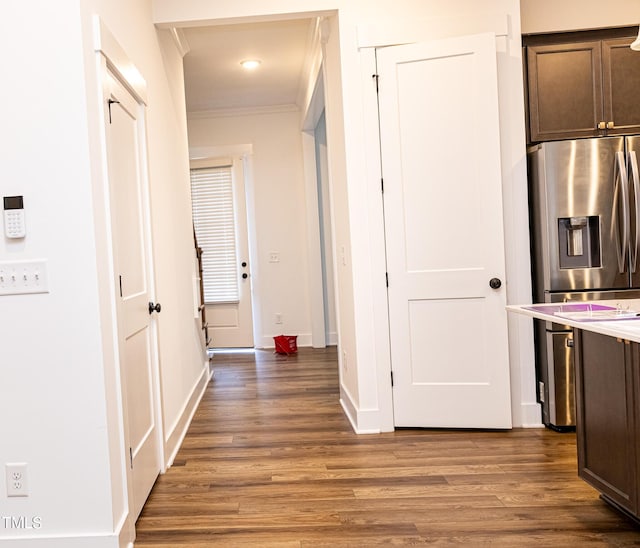 1950 Menet St, Apex, NC 27502 - hallway featuring ornamental molding, wood finished floors, and baseboards