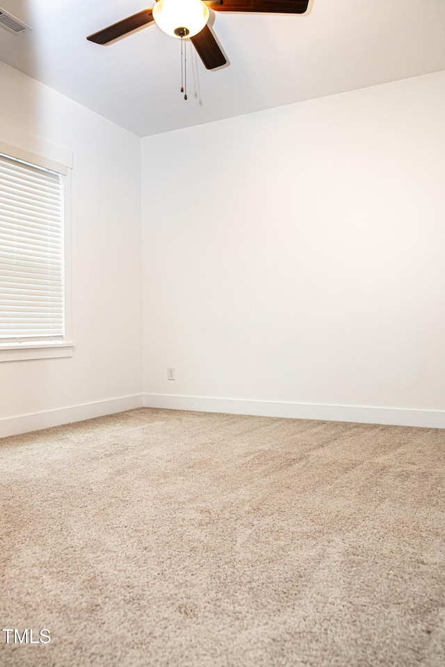 1950 Menet St, Apex, NC 27502 - carpeted spare room featuring ceiling fan and baseboards