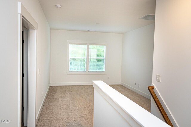 1950 Menet St, Apex, NC 27502 - corridor featuring light carpet and baseboards
