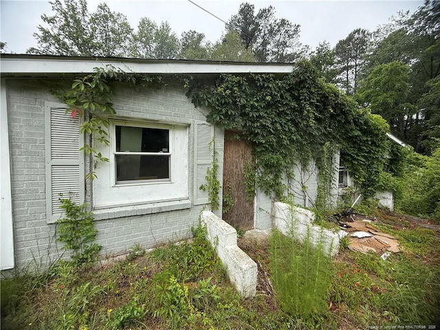 209 Rose St, Spring Lake, NC 28390 - view of property exterior featuring brick siding