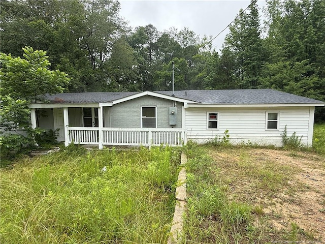 209 Rose St, Spring Lake, NC 28390 - view of front facade with covered porch and roof with shingles