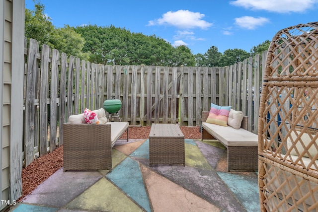 2602 Hitchcock Dr, Durham, NC 27705 - fenced backyard featuring a patio area