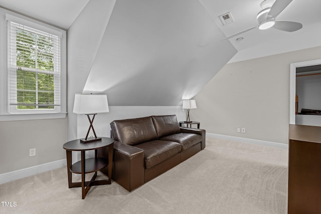 1501 Chatsworth Ln, Raleigh, NC 27614 - carpeted living area with vaulted ceiling, a ceiling fan, healthy amount of natural light, and baseboards