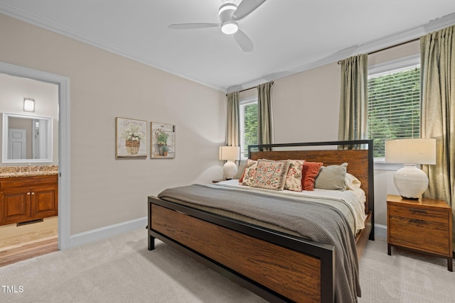 1501 Chatsworth Ln, Raleigh, NC 27614 - bedroom with crown molding, light carpet, baseboards, ensuite bathroom, and a sink