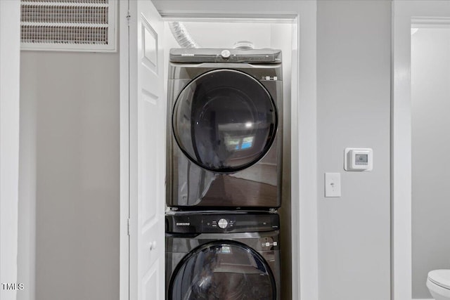 2752 Weldon Ter, Durham, NC 27703 - laundry room featuring stacked washer / dryer