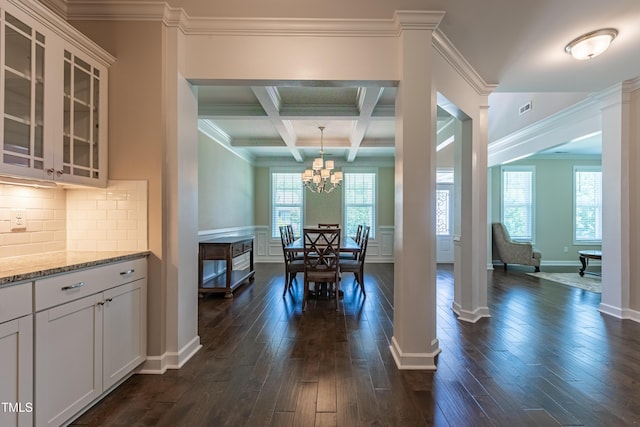 367 Tayside St, Clayton, NC 27520 - dining space featuring dark wood-type flooring, beamed ceiling, a chandelier, ornamental molding, and ornate columns