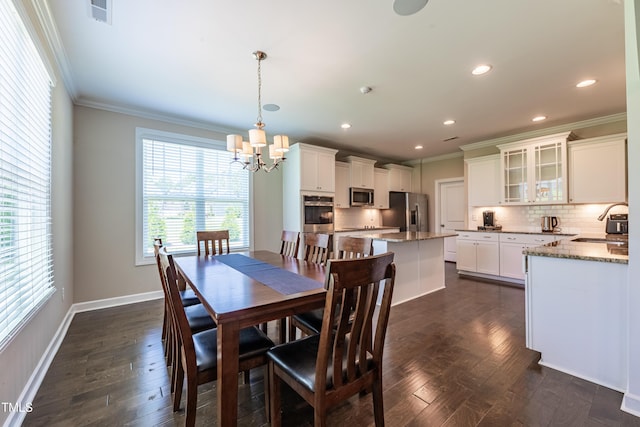 367 Tayside St, Clayton, NC 27520 - dining room featuring crown molding, a chandelier, dark wood finished floors, recessed lighting, and baseboards