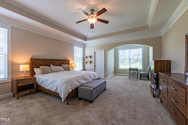 367 Tayside St, Clayton, NC 27520 - bedroom featuring a raised ceiling, light carpet, arched walkways, crown molding, and a ceiling fan