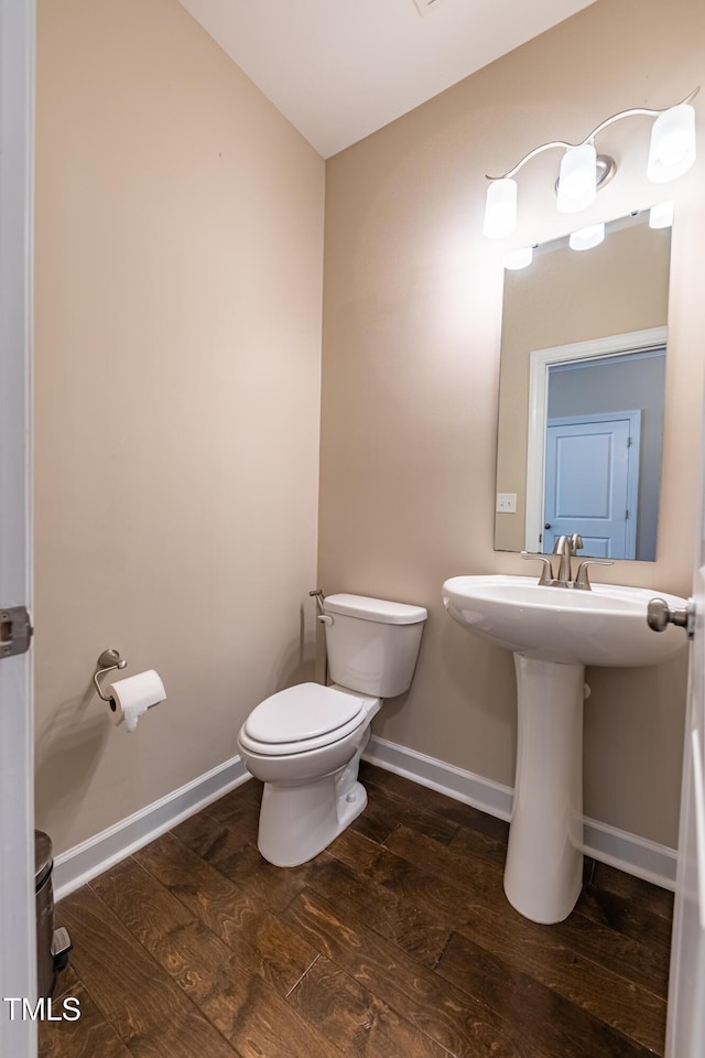 367 Tayside St, Clayton, NC 27520 - half bath featuring toilet, wood finished floors, and baseboards