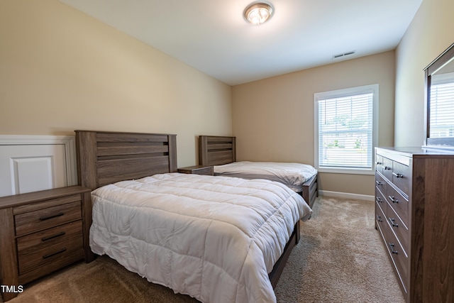 367 Tayside St, Clayton, NC 27520 - carpeted bedroom featuring multiple windows and baseboards
