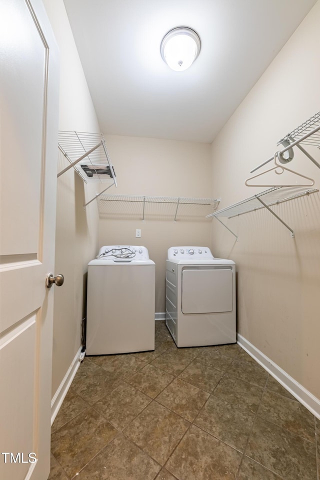 367 Tayside St, Clayton, NC 27520 - washroom with washer and clothes dryer and baseboards