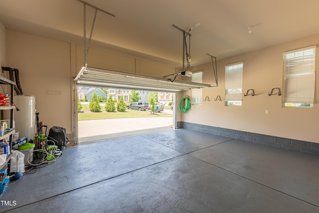 367 Tayside St, Clayton, NC 27520 - garage with electric water heater and a garage door opener