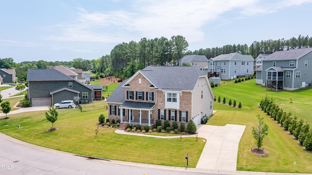 367 Tayside St, Clayton, NC 27520 - view of front of home featuring a residential view, driveway, a garage, a porch, and a front lawn