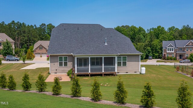 367 Tayside St, Clayton, NC 27520 - back of property featuring crawl space, a yard, roof with shingles, and a sunroom
